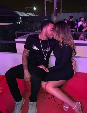 Myles Troy Deeney's father, Troy Deeney with his girlfriend.